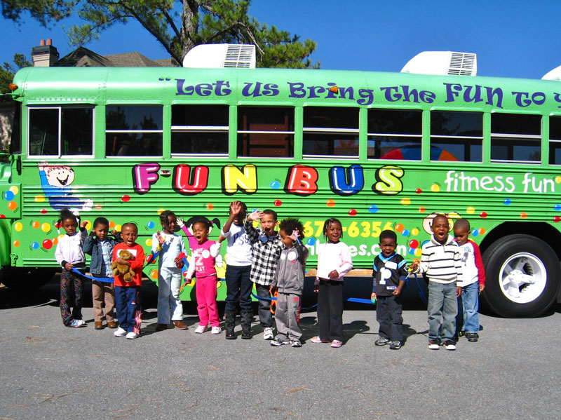 There are endless benefits of franchising with FUN BUS - like these cute kids and their excitement seeing the BRIGHT GREEN BUS!