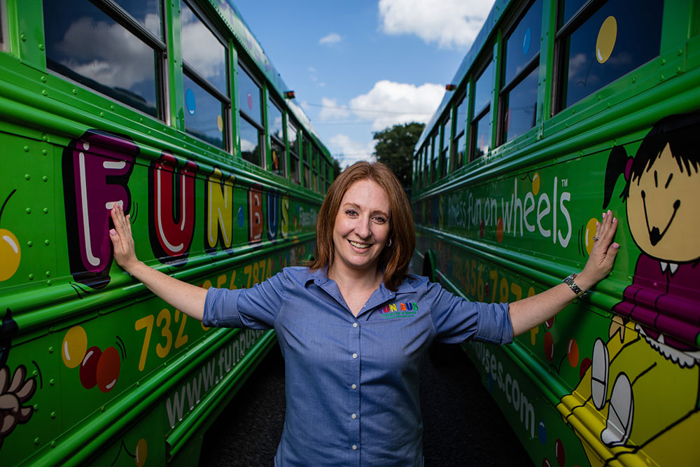 FUN BUS owner happy after experiencing the advantages of franchising.